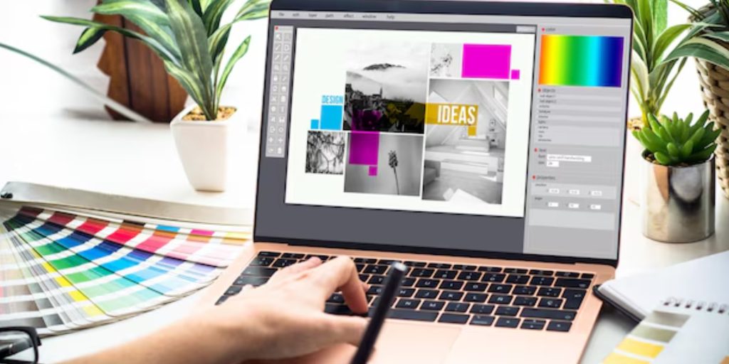 A creative designer working on a laptop